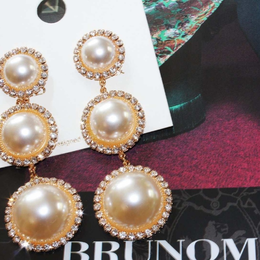 Long gold pearl earrings
